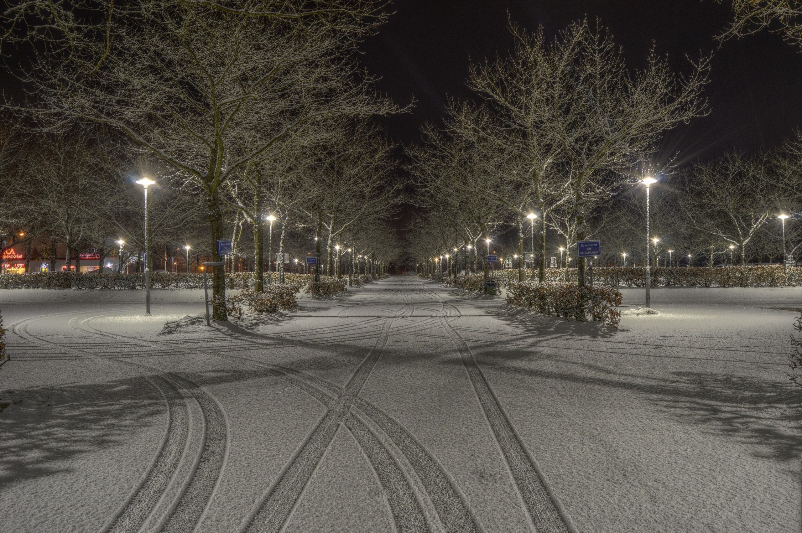 Snow accumulating in parking lot